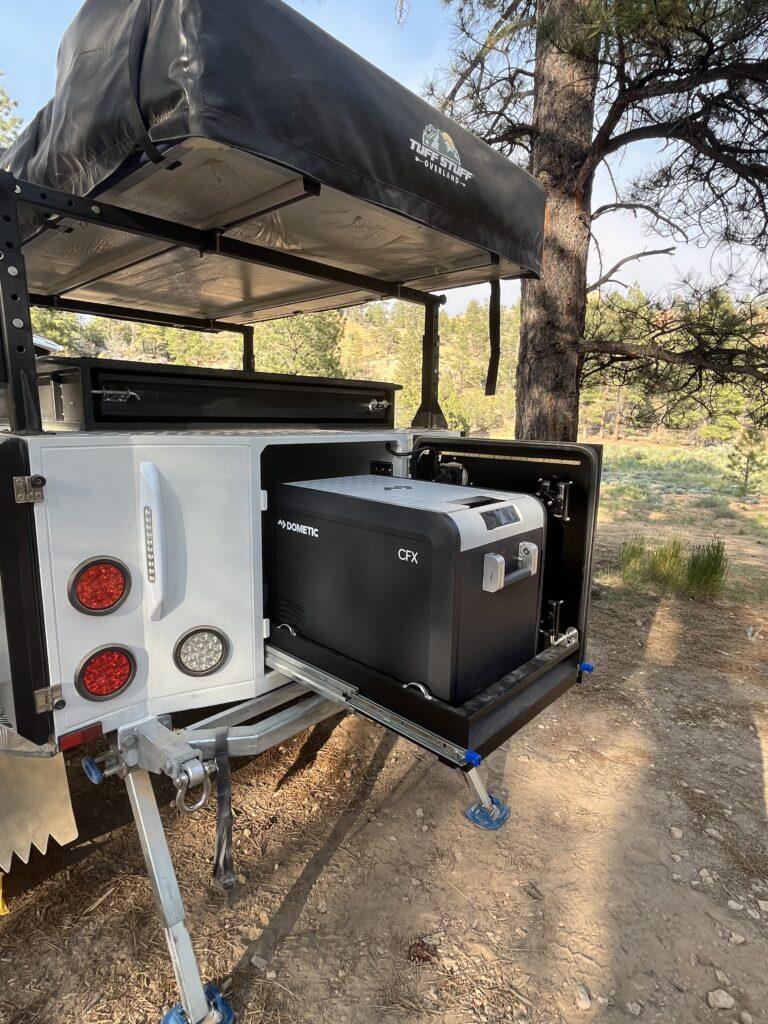 Dometic cooler in the back of an overland trailer